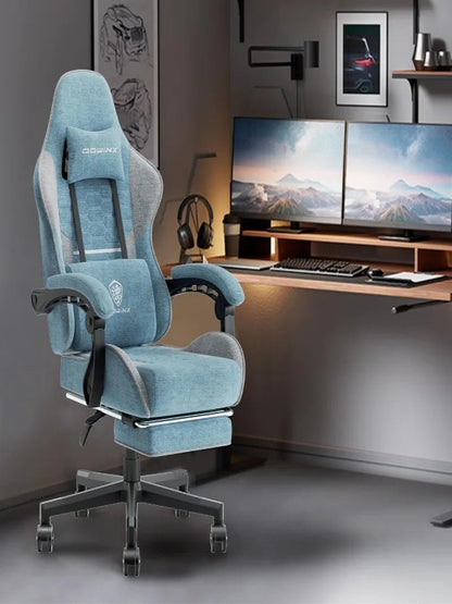 Blue office chair in a modern office setting with two monitors on a desk.