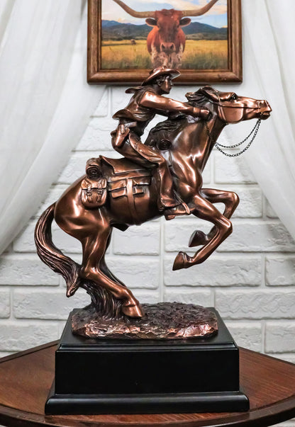 Rustic Western Wild Cowboy Bracing on a Galloping Horse Bronzed Resin Statue