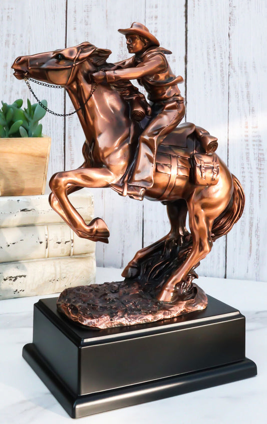 Rustic Western Wild Cowboy Bracing on a Galloping Horse Bronzed Resin Statue